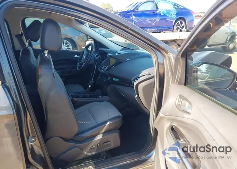 2017 Ford Escape Titanium z USA, uszkodzony, nr VIN 1FMCU0J91HUE85232